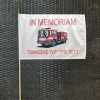 A flag with the words " in memoriam townsend twp fire dept ".