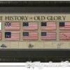 A framed picture of the american flag with the words " the history of old glory ".