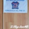 A sign that says " fire department in memoriam."