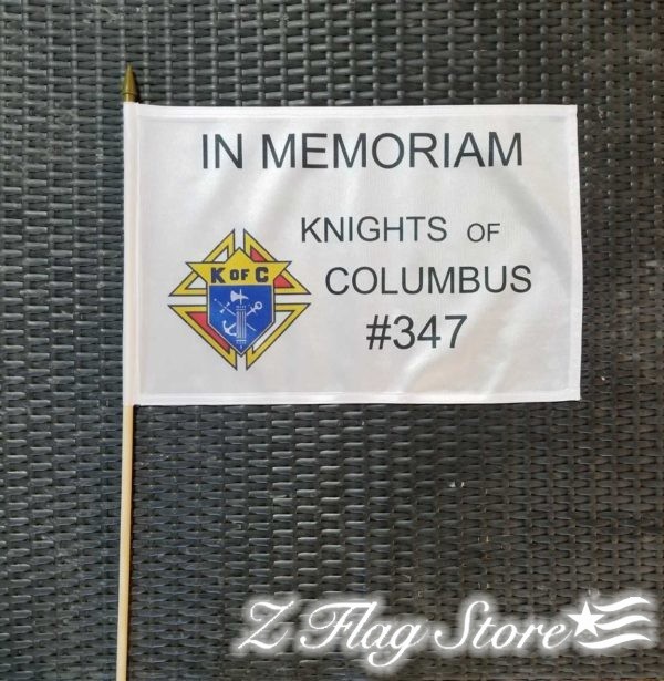 A flag with the knights of columbus on it.