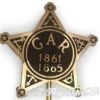 A gold star with the letters gar and numbers 1 8 6 1-1 8 6 5.