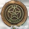 A wooden plaque with the words war veteran on it.