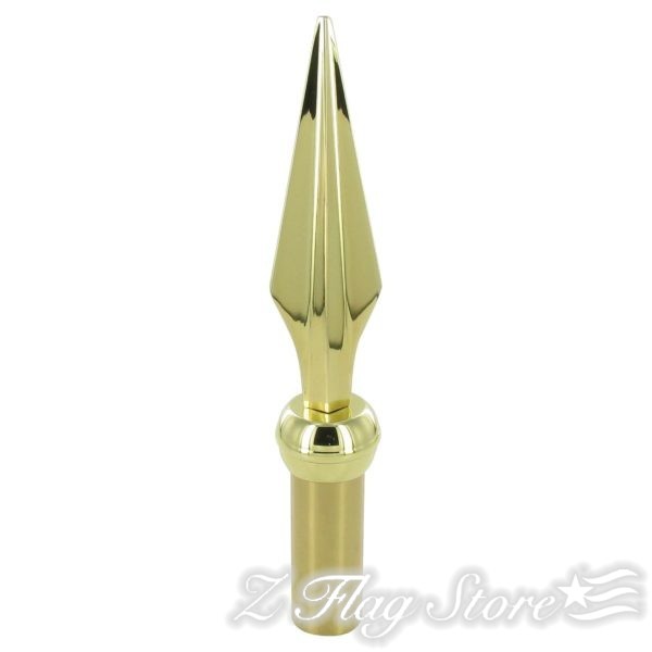 A gold colored pen with pointed tip.