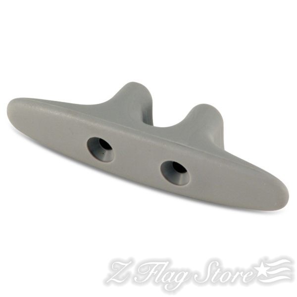 A gray plastic object with two holes in it.