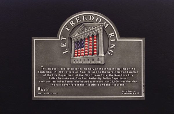 A plaque with the words " let freedom ring ".