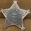 A civil war veteran badge sitting on top of a couch.